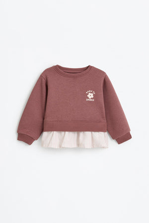 Sweatshirt with ruffle detail.