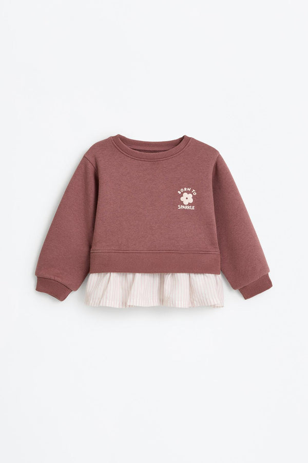 Sweatshirt with ruffle detail.