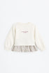 Sweatshirt with ruffle detail.
