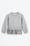 Sweatshirt with ruffle detail.
